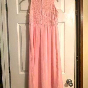 A nice formal pink dress that can be worn to a ball or prom which is a size 16.